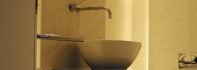 Bathroom Design. Luxury Bathroom made from Limestone & black Granite - Customized solution with limestone blocks and indirect lighting.jpg